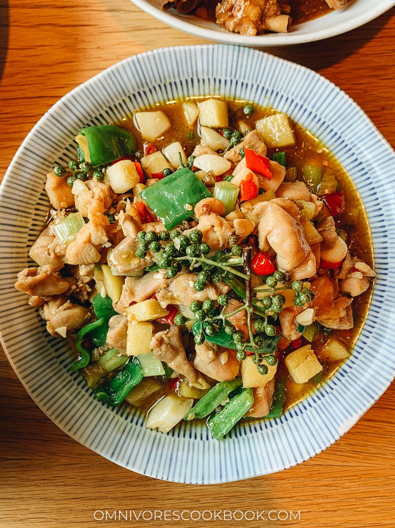 Chicken thigh stir fried with green peppercorns and chili pepper