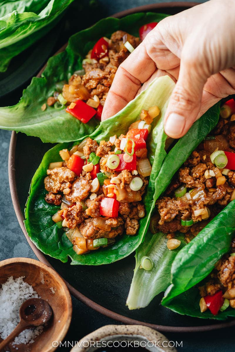 Scooping up Chinese pork lettuce wrap