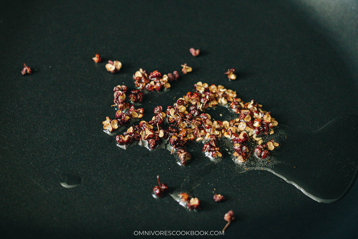 Frying Sichuan peppercorns