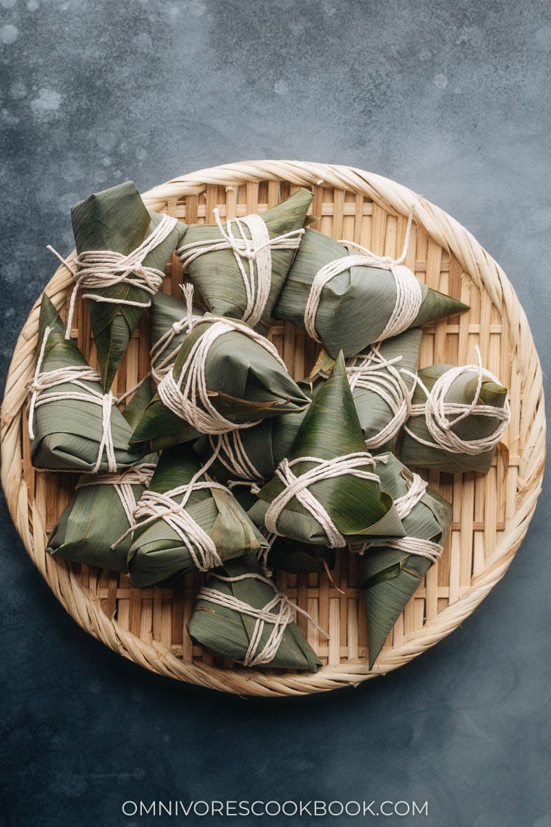 Uncooked alkaline dumplings on a bamboo tray