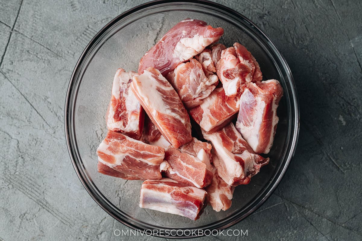 Raw pork riblets in a bowl