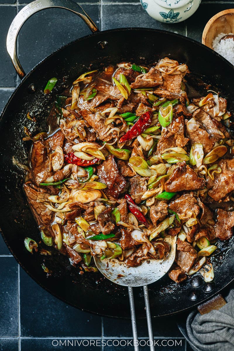 Scallion beef stir fry in a pan