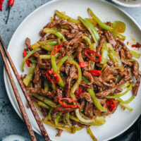 Shredded beef and pepper stir fry features tender juicy beef and crisp peppers cooked with a spicy savory sauce. It’s easy to prepare and has a very bold flavor. Serve it over steamed rice - it’s a perfect weekday dinner that is super appetizing and healthy.