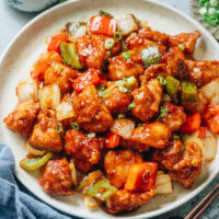 Better than takeout air fryer sweet and sour chicken that has crispy juicy chicken and crunchy vegetables served with a rich sauce. It’s so easy to put together, uses way less oil than the regular version, and tastes so great! {Gluten-Free Adaptable}