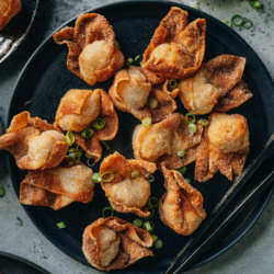These fried wontons are crispy little flavor bombs! They are packed with shrimp, pork, and fresh aromatics and they’re a ton of fun to eat. Impress your guests by serving them as an appetizer at your next party with the included spicy dipping sauce. As a bonus - you can even make them in the air fryer!