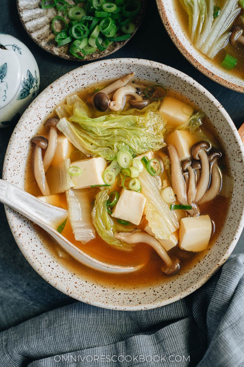Chicken soup with napa cabbage, tofu and mushrooms