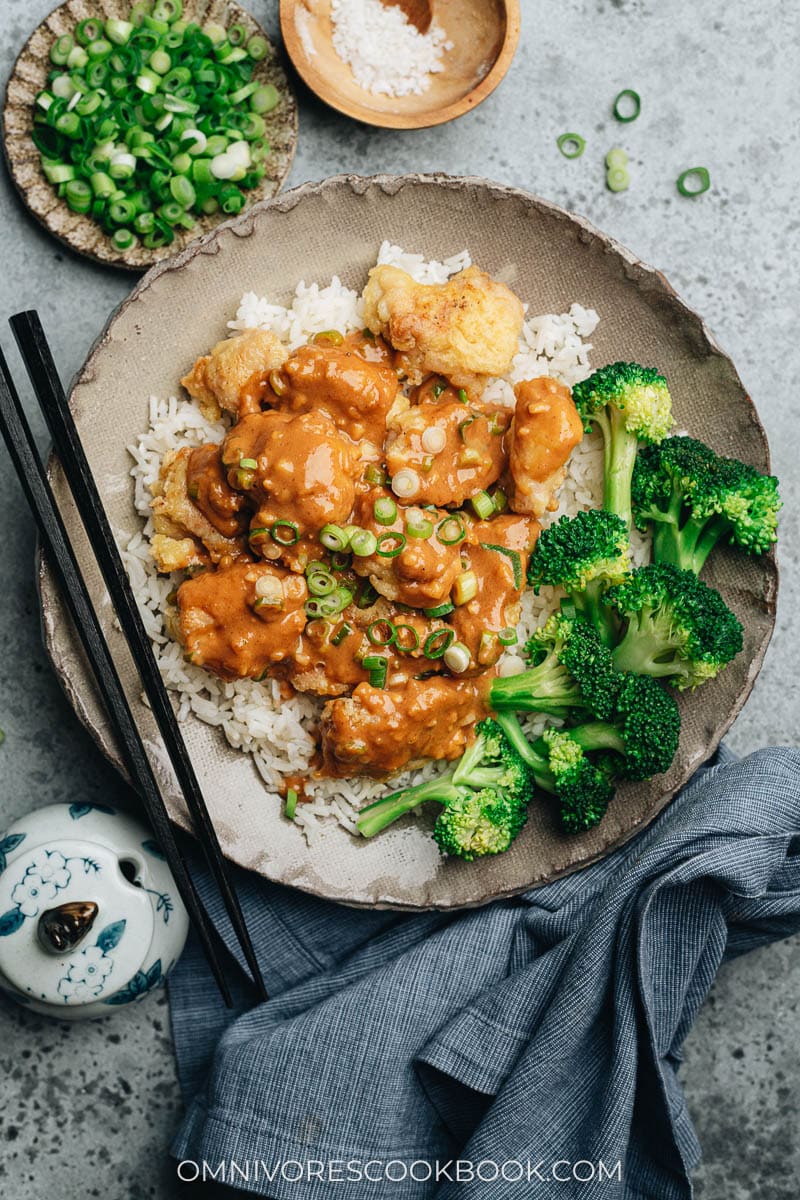 Homemade peanut butter chicken with broccoli over steamed rice