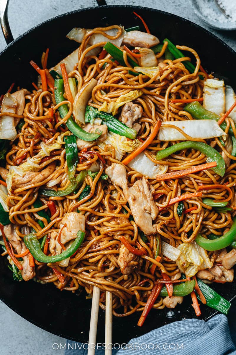 Chicken Lo Mein with peppers, napa cabbage and carrots close up