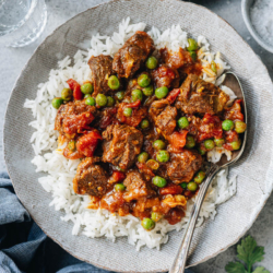 The easiest and quickest Instant Pot curry beef stew recipe that yields melt-in-your-mouth beef smothered in a rich, thick tomato curry sauce. Simply dump everything into the pot - no browning or sauce reducing required. {Gluten-Free Adaptable}