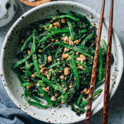 Chinese spinach salad is a cold appetizer that features tender blanched spinach and crispy peanuts tossed in a gingery vinegar dressing. It's a simple and highly nutritious dish that is perfect to complete your weekday meal. {Vegan, Gluten-Free Adaptable}