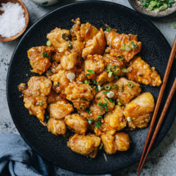 An easy orange chicken recipe that creates crispy chicken without deep-frying and a scrumptious orange sauce that is very fragrant and not too sugary. Make this dish at home to enjoy restaurant style Chinese food made with healthier ingredients! {Gluten-Free Adaptable}
