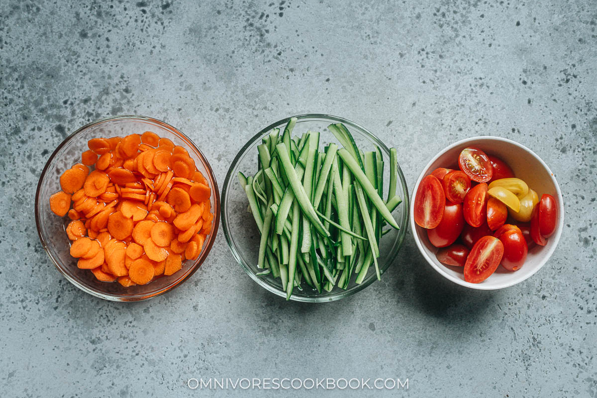 Pickled carrot, cucumber salad and tomato salad