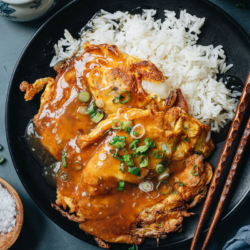 Chicken egg foo young features bean sprouts and bites of chicken crafted into a Chinese-style omelet topped with a rich and savory brown sauce you simply can’t resist! This Chinese takeout favorite is easy to make at home and tastes so satisfying. {Gluten-Free Adaptable}