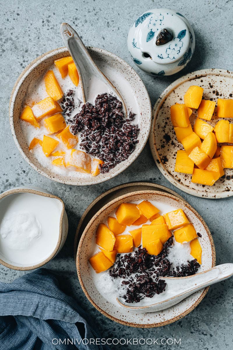 Black rice pudding with coconut milk and mango