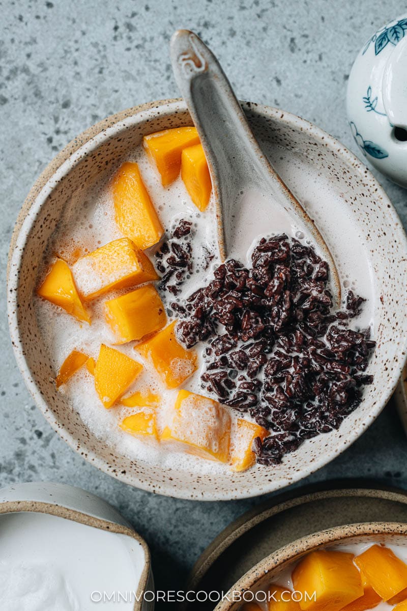 Black rice pudding with coconut milk close up