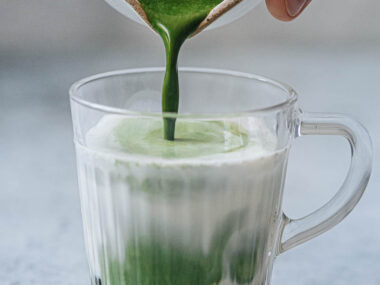 Pouring matcha to make matcha bubble tea