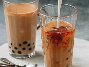 Pouring milk into bubble tea