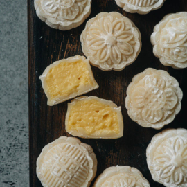 Snow skin mooncake with custard sliced open close up