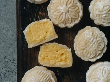 Snow skin mooncake with custard sliced open close up