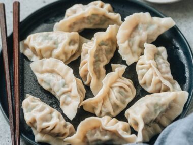Boiled pork and chive dumplings close up