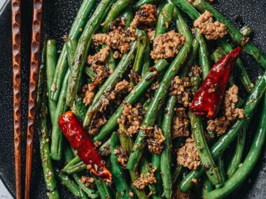Sichuan dry fried green beans in a plate