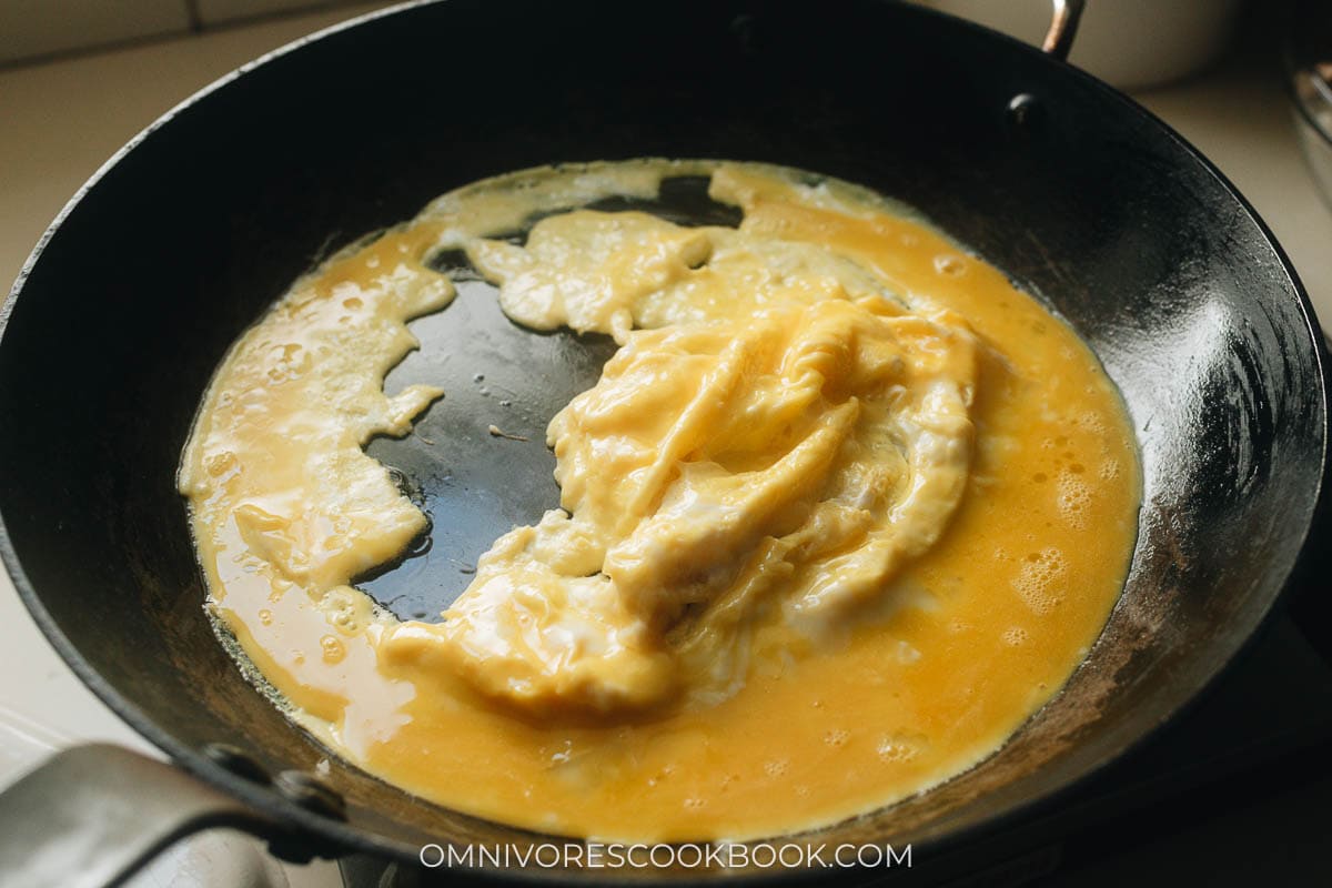 Scramble eggs in a pan