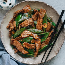 Beef and flat bean stir fry is a quick main dish featuring juicy tender beef and thick romano beans brought together with a fragrant brown sauce. {Gluten-Free adaptable}