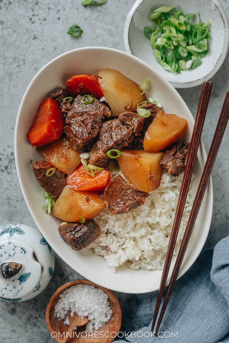 Braised beef with potato and carrot served with rice