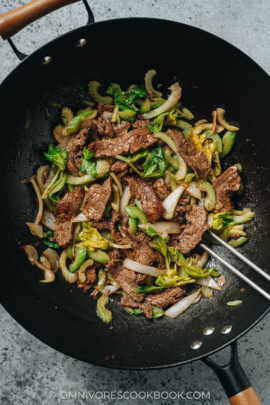 Stir fried beef and celery in a wok
