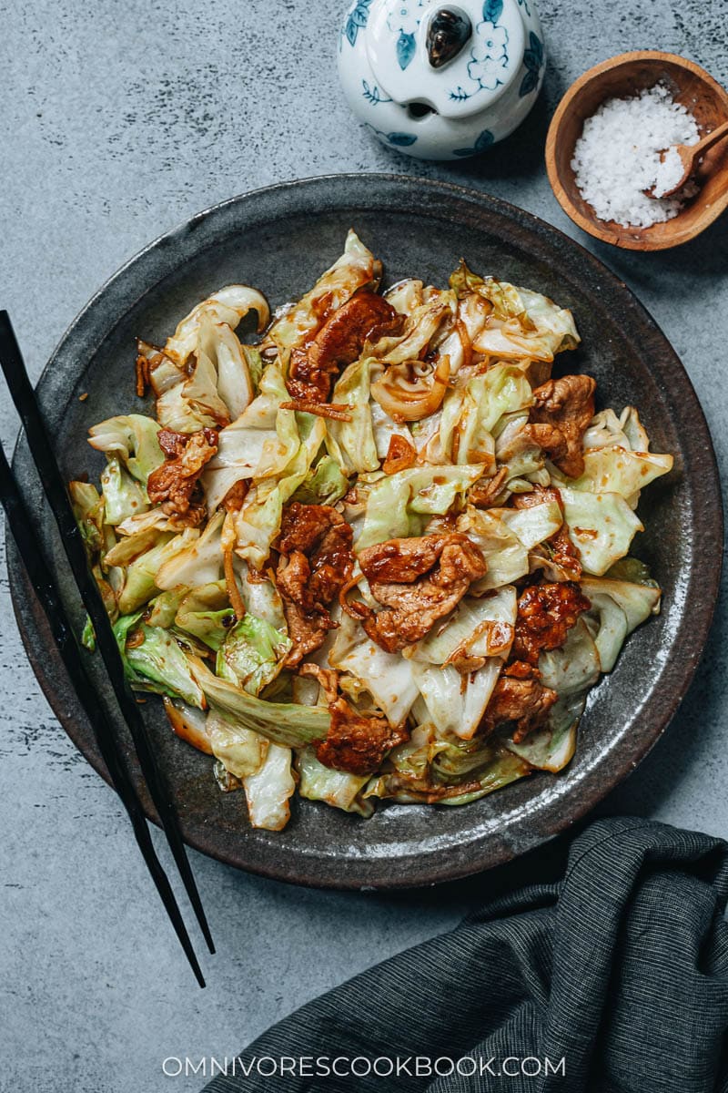 Pork and cabbage stir fry in a plate