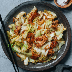 This pork and cabbage stir fry is an irresistible homestyle dish that is easy to make and very comforting. It combines tender slices of marinated pork with sweet, buttery Taiwanese flat cabbage. Try it and you’ll be surprised how something so simple can be so satisfying!