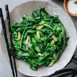 This simple yu choy stir fry requires only 4 ingredients and 10 minutes to put together. It’s a quick side dish you can throw together in a rush to add nutrition to your dinner. {Gluten-Free, Vegan}