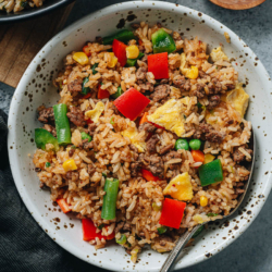 This easy beef fried rice uses a bold seasoning of chili and cumin. It requires very little prep and only takes 10 minutes to cook. A one-pan dish that’s satisfying enough to serve as a main for dinner, or packed into your lunch box for meal-prep, or served as a fancy side for your Chinese dinner party. {Gluten-Free adaptable}
