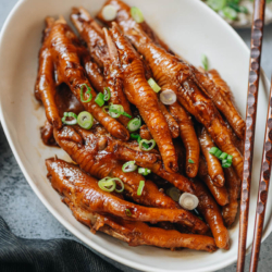 Northern Chinese style braised chicken feet featuring a tender texture and a rich savory flavor that is full of umami. It’s a great appetizer to wash down with a glass of cold beer and a fun snack for movie night.