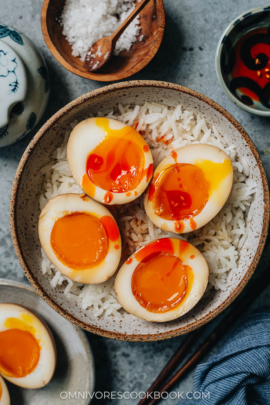 Chinese style marinated eggs over rice