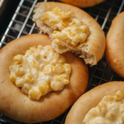 Fluffy and tender Chinese corn mayo bread made with a milk bread dough, topped with a gooey corn mayonnaise topping. Make the Chinese bakery style bread in your own kitchen for breakfast, an afternoon snack or picnic! {Vegetarian}