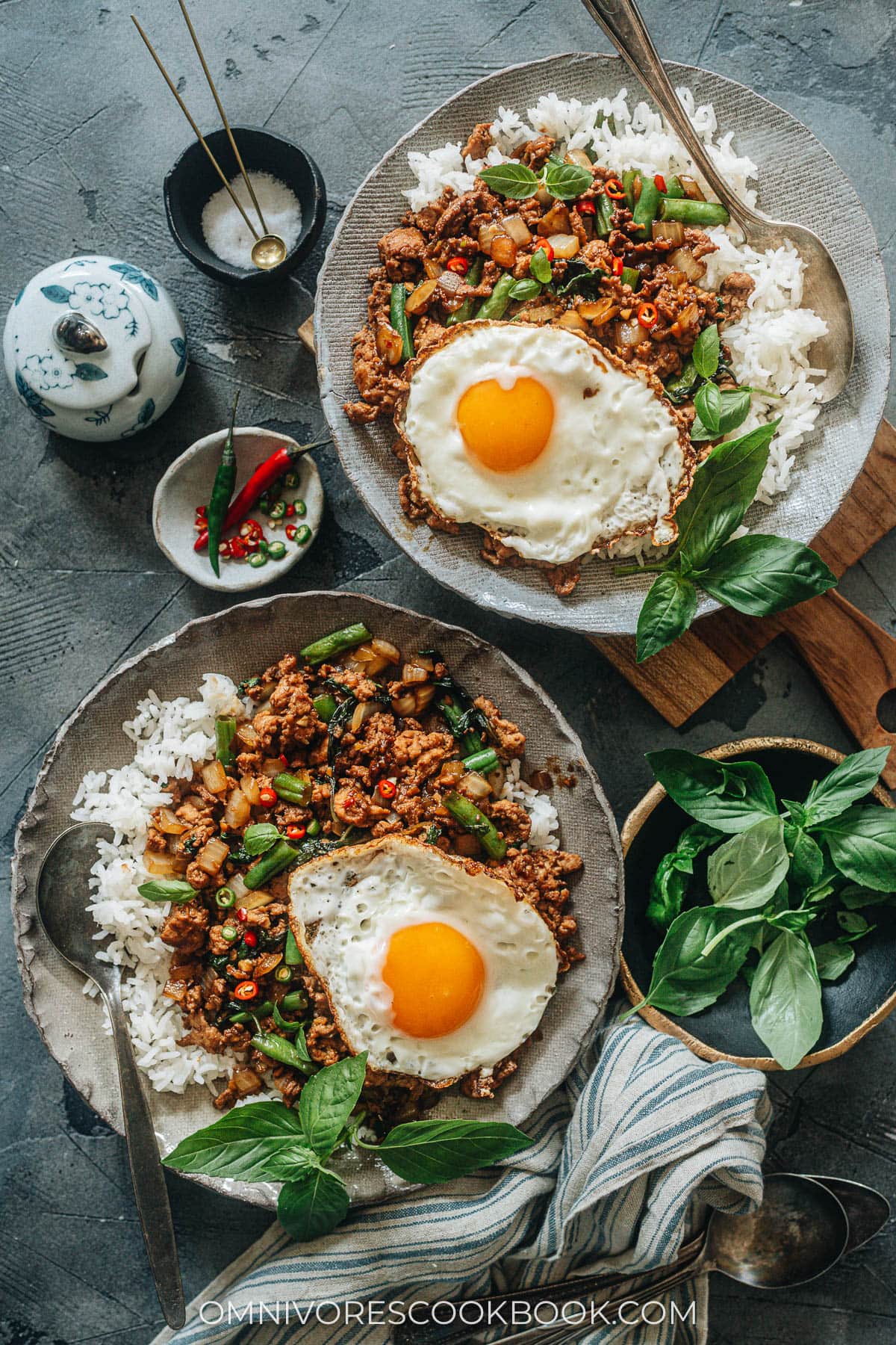 Thai basil chicken over rice with sunny eggs