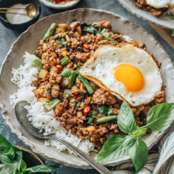 The fastest way to get great tasting Thai food is to make it in your own kitchen with this aromatic, flavorful and healthy Thai basil chicken recipe. {Gluten-Free Adaptable}