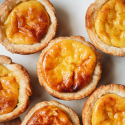 A portuguese egg tart recipe that creates a crispy crunchy layered crust with a creamy and well balanced custard filling that is not too sweet. No matter if you're serving them for a weekend brunch, afternoon tea snack, or as an edible gift, they are the perfect option. {Vegetarian}