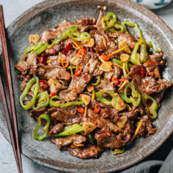 An authentic Hunan beef recipe featuring a more layered flavor and spicy taste, along with tender juicy beef and crisp chili peppers stir fried with a brown sauce that’s full of umami. {Gluten-Free Adaptable}