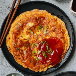 Enjoy the taste of the sea with the oyster omelet, a simple dish with a sophisticated flavor. The interplay of textures — crispy omelet edges, tender egg, and juicy oyster — combined with the savory, umami-rich flavor profile, makes it a dish that’s both comforting and exciting. The dipping sauce is sweet and tangy, adds an additional layer of flavor, enhancing the overall taste and making each bite irresistible.