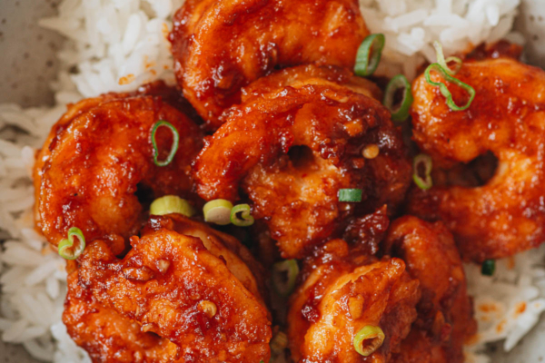 Shrimp in chili garlic sauce with rice close up