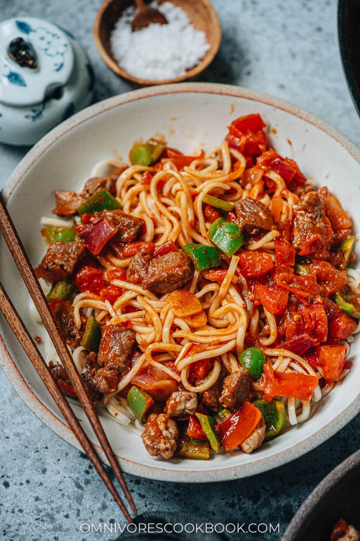 Xinjiang style noodles served with lamb sauce