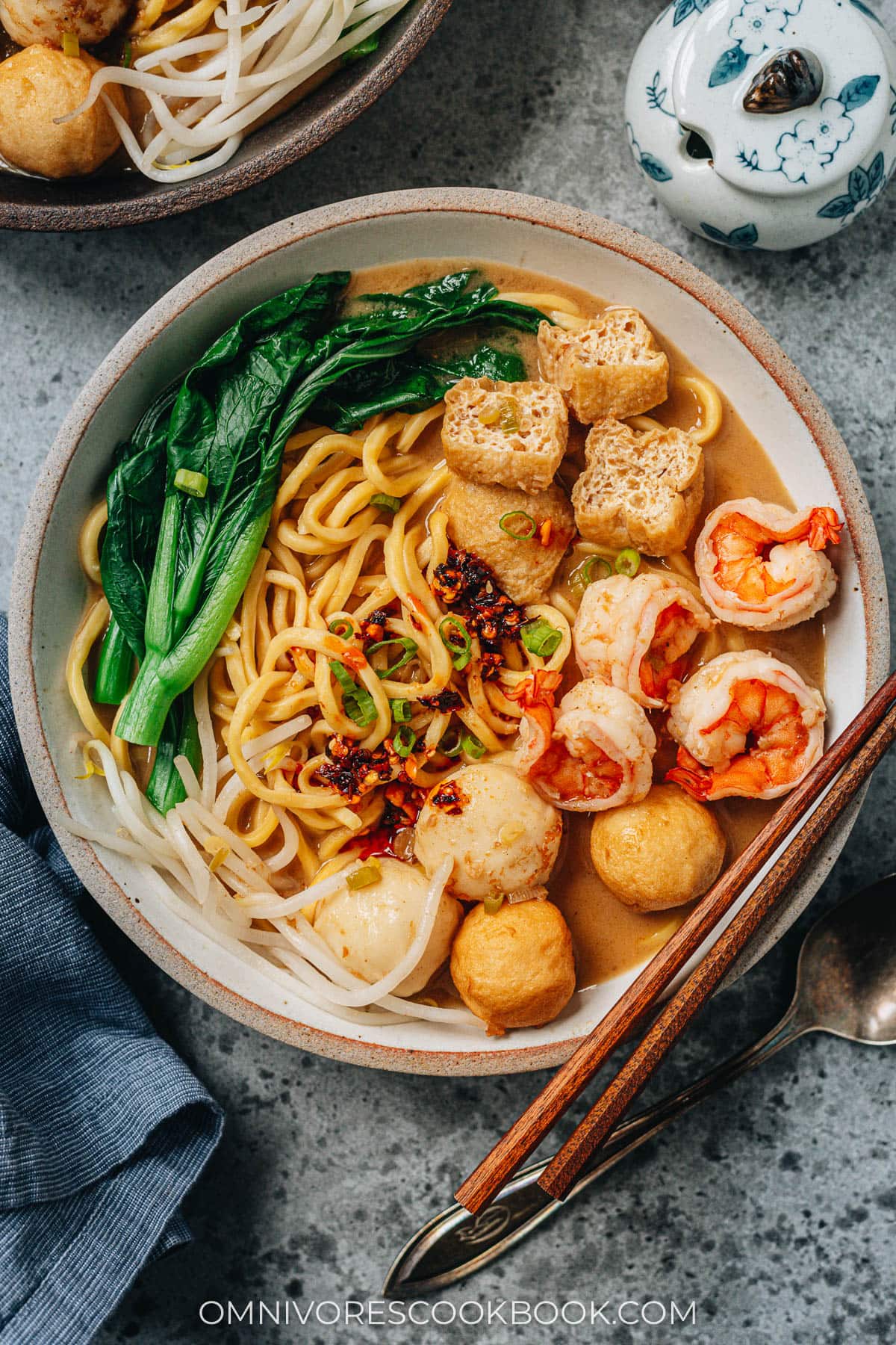 Homemade satay noodle soup with fish balls and shrimp