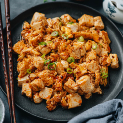 Egg and tofu stir fry is a super easy one-pot meal that is hearty, rich in flavor, and full of nutrition. The tender silken tofu is cooked with scrambled eggs and finished up with a fragrant sauce that’s savory, slightly sweet, and spicy. Serve it by itself or over rice for a quick and satisfying meal! {Vegetarian adaptable, gluten-free adaptable}