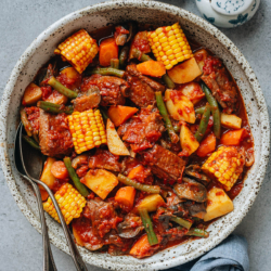 Pork and vegetable stew is a scrumptious one-pot meal featuring tender pork and assorted vegetables brought together with a tomato based sauce. It is hearty, filling, and full of nutrition, perfect for your Sunday dinner or meal prep.