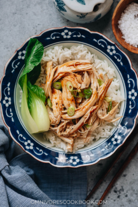 Shredded chicken breast with bok choy over rice