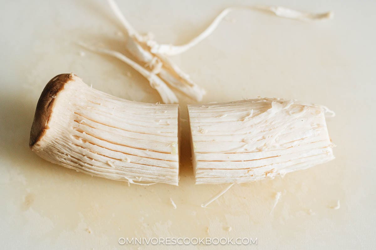 Cut a king oyster mushroom into halves