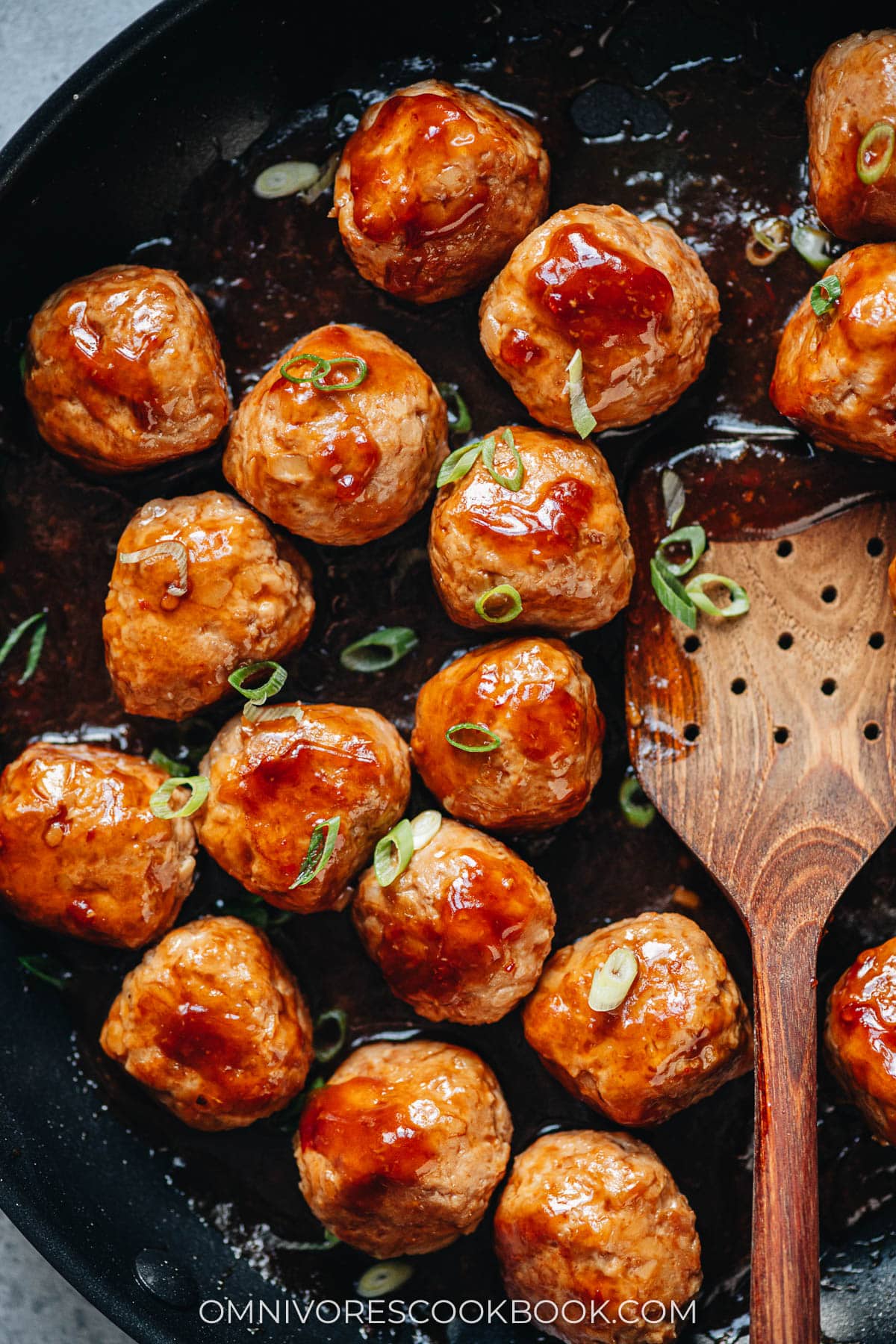 Asian turkey meatballs in a pan close up