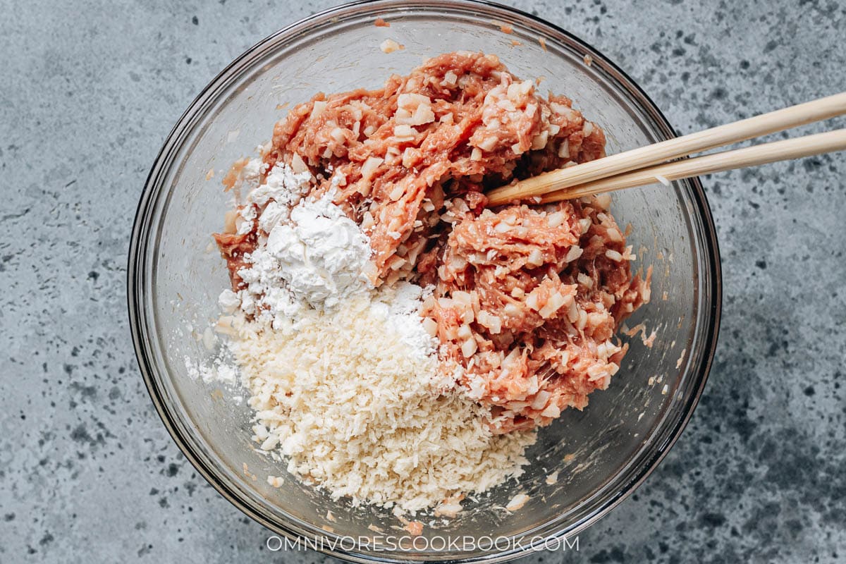 Adding panko and cornstarch into the ground meat